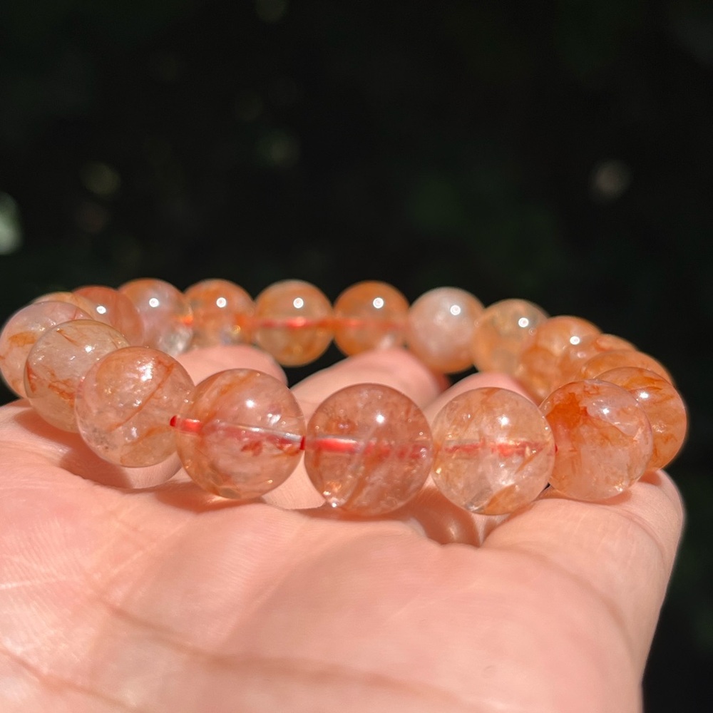12mm stretchable‎ orange color fire Quartz bracelet
